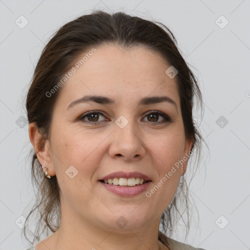 Joyful white young-adult female with medium  brown hair and brown eyes