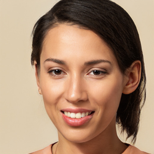 Joyful white young-adult female with long  brown hair and brown eyes