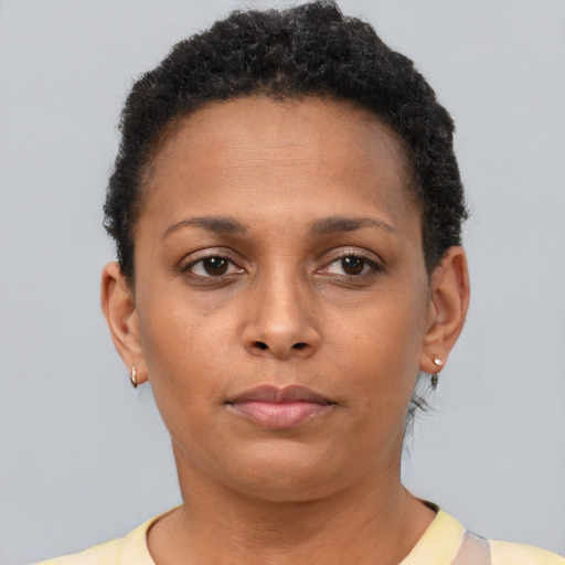 Neutral black young-adult female with short  brown hair and brown eyes