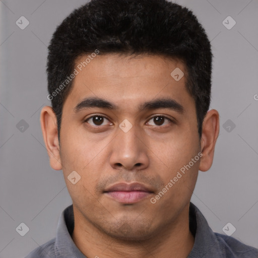 Neutral latino young-adult male with short  black hair and brown eyes