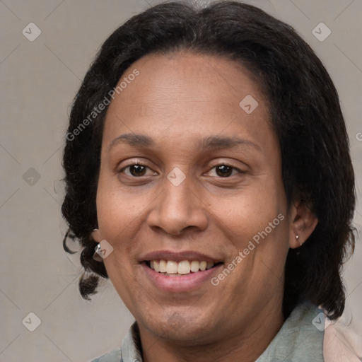 Joyful white adult female with medium  brown hair and brown eyes