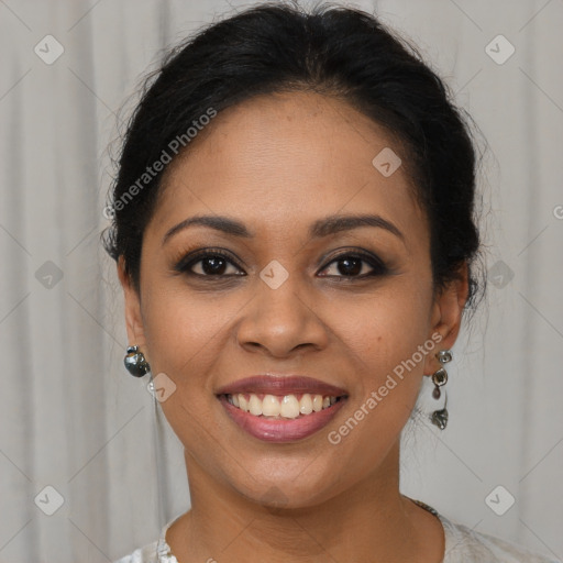 Joyful latino young-adult female with long  brown hair and brown eyes