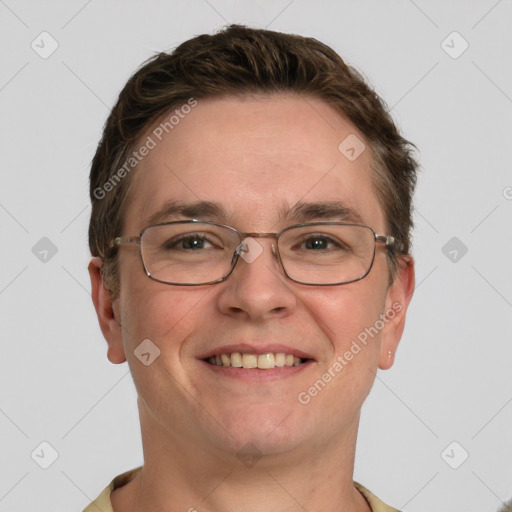 Joyful white adult male with short  brown hair and grey eyes