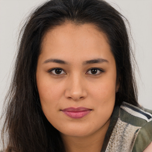 Joyful asian young-adult female with long  brown hair and brown eyes