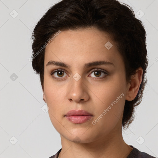 Neutral white young-adult female with short  brown hair and brown eyes