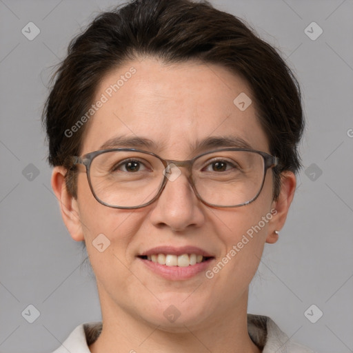 Joyful white adult female with medium  brown hair and brown eyes