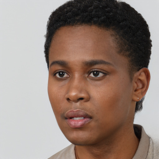 Neutral black young-adult male with short  black hair and brown eyes