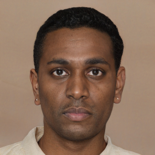 Neutral black young-adult male with short  black hair and brown eyes