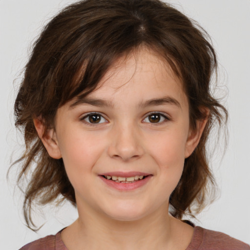 Joyful white child female with medium  brown hair and brown eyes