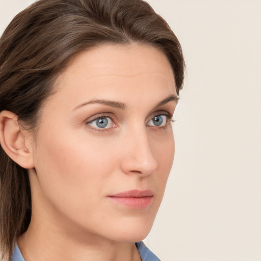 Neutral white young-adult female with medium  brown hair and grey eyes