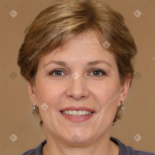 Joyful white adult female with short  brown hair and brown eyes