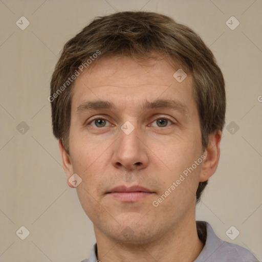 Neutral white young-adult male with short  brown hair and grey eyes