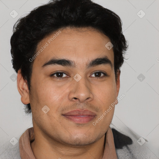 Joyful latino young-adult male with short  brown hair and brown eyes