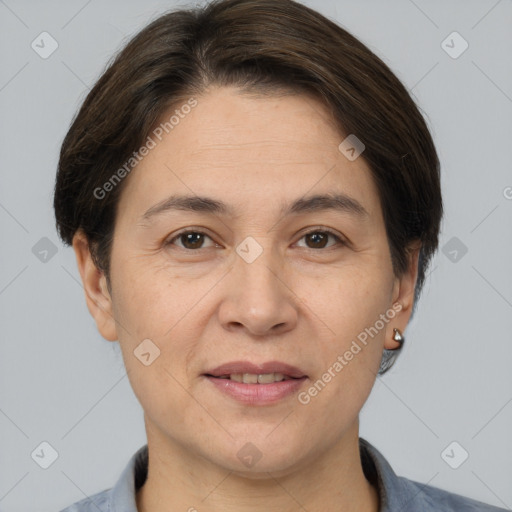 Joyful white adult female with short  brown hair and brown eyes