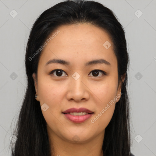 Joyful asian young-adult female with long  brown hair and brown eyes