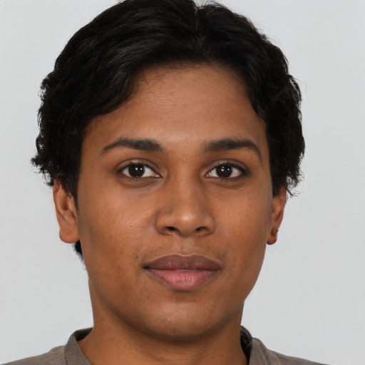Neutral black young-adult female with short  brown hair and brown eyes