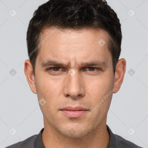 Neutral white adult male with short  brown hair and brown eyes