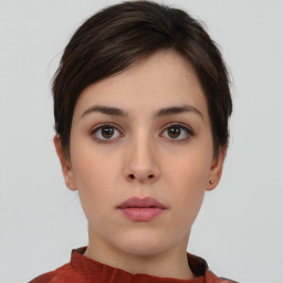 Neutral white young-adult female with short  brown hair and brown eyes