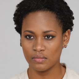 Neutral black young-adult female with short  brown hair and brown eyes