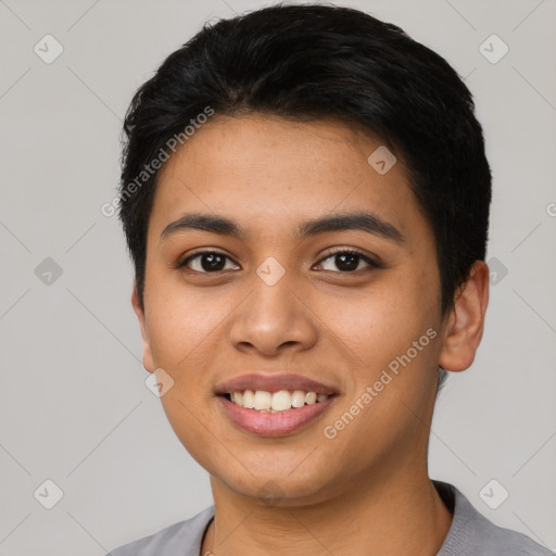 Joyful asian young-adult female with short  black hair and brown eyes