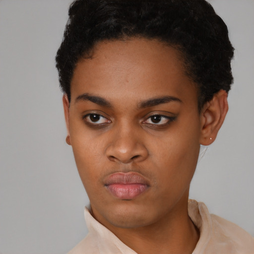 Neutral black young-adult female with short  black hair and brown eyes