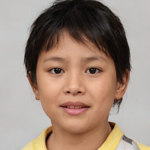 Joyful white child female with medium  brown hair and brown eyes