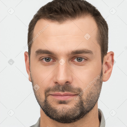 Neutral white young-adult male with short  brown hair and brown eyes