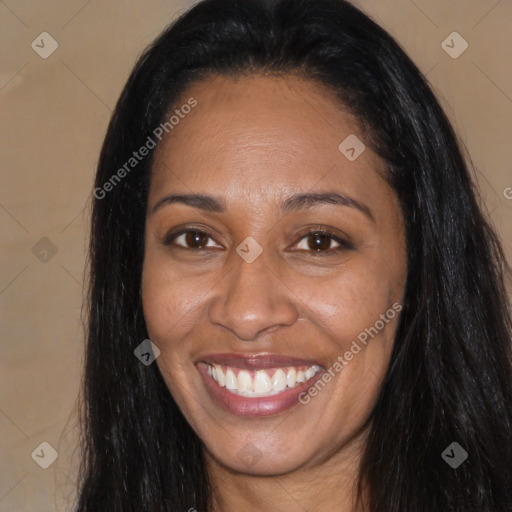 Joyful latino young-adult female with long  brown hair and brown eyes