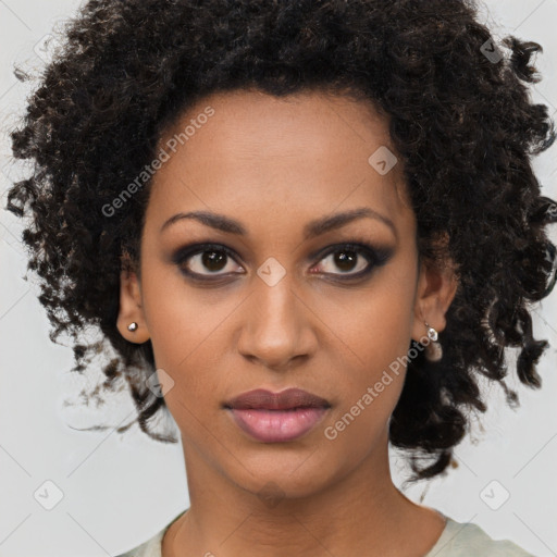 Neutral black young-adult female with medium  brown hair and brown eyes