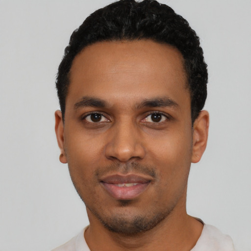 Neutral black young-adult male with short  black hair and brown eyes