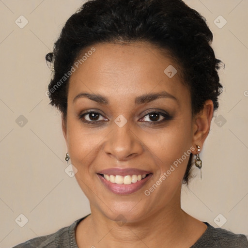 Joyful latino young-adult female with short  black hair and brown eyes