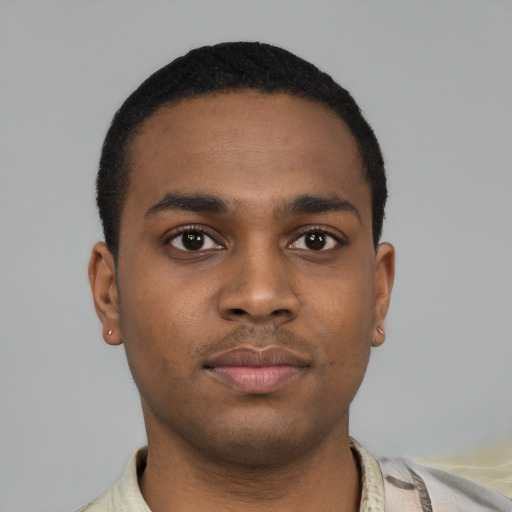 Neutral black young-adult male with short  black hair and brown eyes