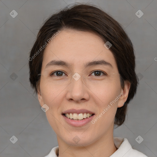 Joyful white adult female with medium  brown hair and brown eyes