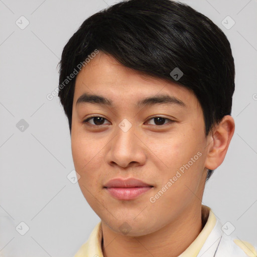 Joyful asian young-adult male with short  brown hair and brown eyes