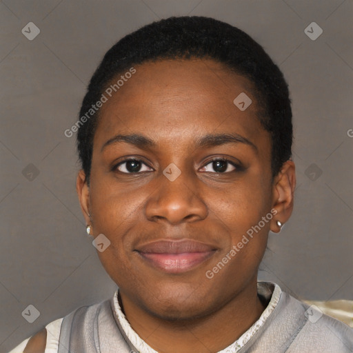 Joyful black young-adult female with short  brown hair and brown eyes