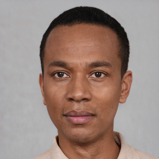 Neutral latino adult male with short  black hair and brown eyes