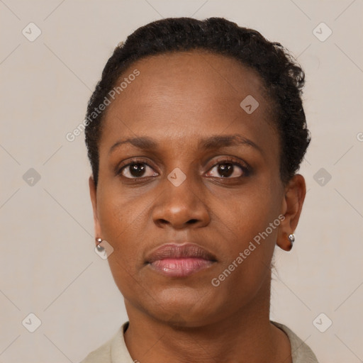 Neutral black young-adult female with short  brown hair and brown eyes