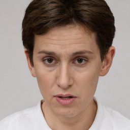 Neutral white adult female with short  brown hair and brown eyes