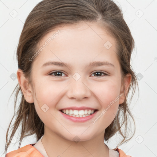 Joyful white child female with medium  brown hair and brown eyes