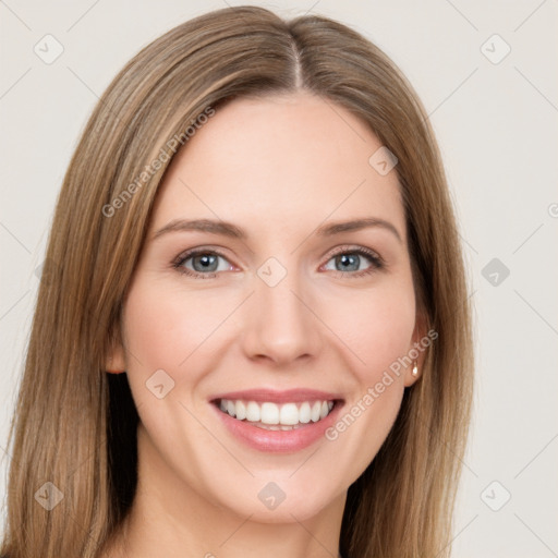 Joyful white young-adult female with long  brown hair and green eyes