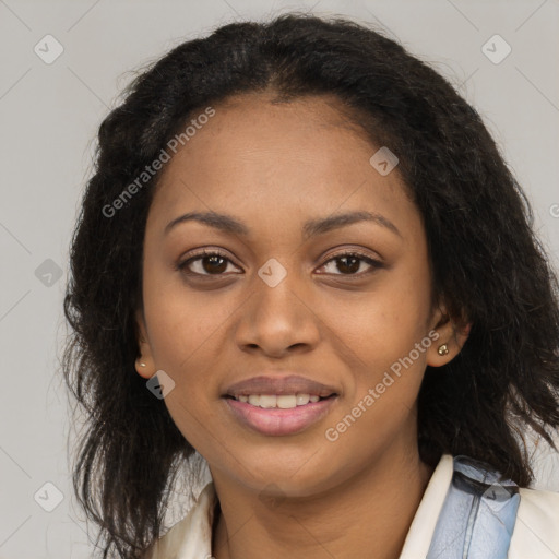 Joyful black young-adult female with long  brown hair and brown eyes