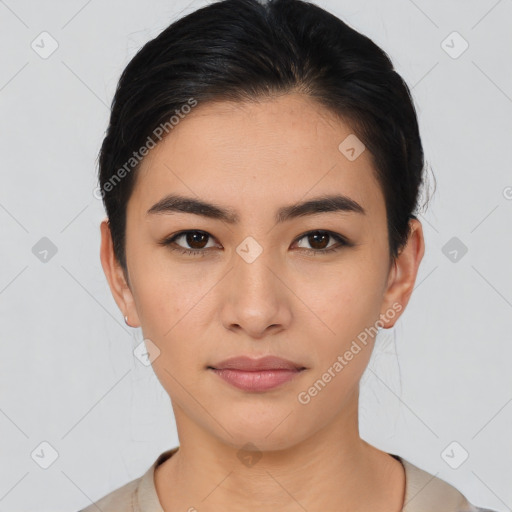 Joyful asian young-adult female with short  brown hair and brown eyes