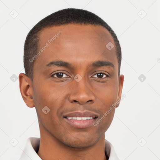 Joyful black young-adult male with short  brown hair and brown eyes