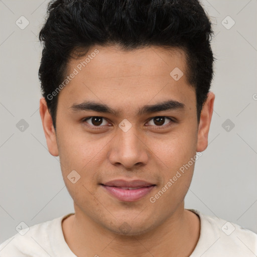 Joyful latino young-adult male with short  brown hair and brown eyes