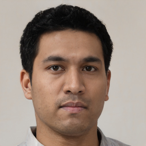 Neutral asian young-adult male with short  black hair and brown eyes