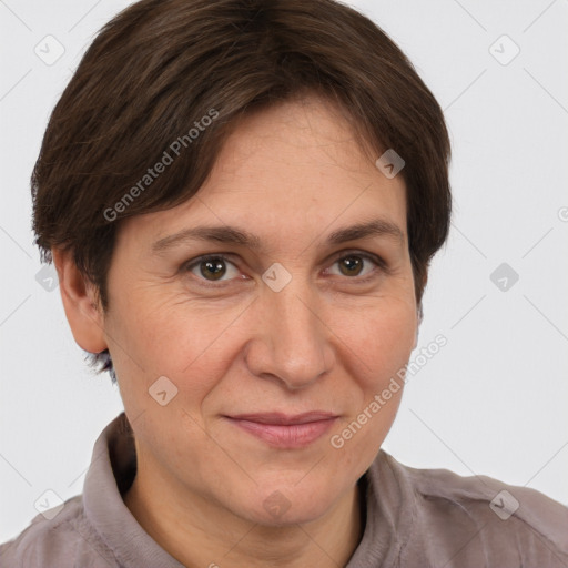 Joyful white adult female with short  brown hair and brown eyes