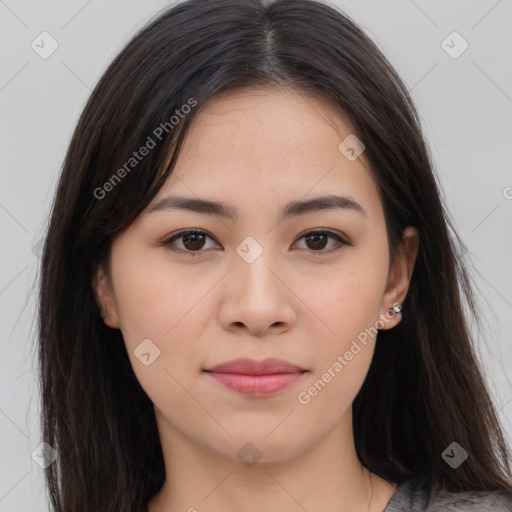 Joyful asian young-adult female with long  brown hair and brown eyes