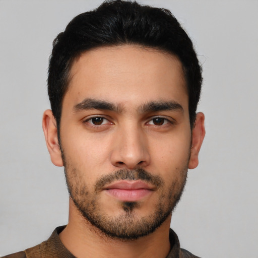 Neutral latino young-adult male with short  black hair and brown eyes