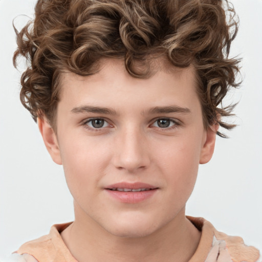 Joyful white child male with short  brown hair and brown eyes