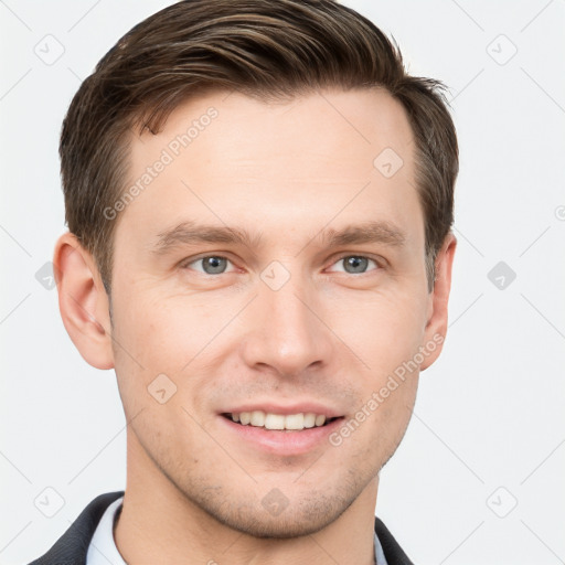 Joyful white young-adult male with short  brown hair and grey eyes